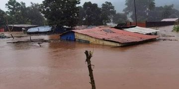 Des maisons inondees a Coyah