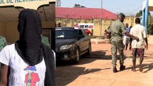 Limage dun presume violeur tenue par un gendarme a droite et sa presumee victime a gauche a la Brigade de Recherche de Coyah