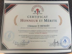 Clément II Benoît honoré aux Gonaïves : le livre comme flambeau de mémoire 2 Certificat Honneur et Merite décerné à Dr Clément II Bénoit